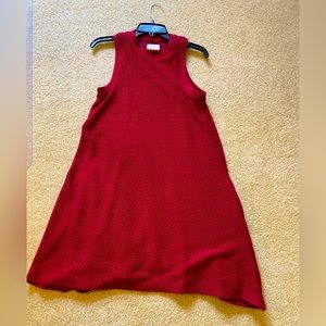 super cute red dress. lined with side pockets.